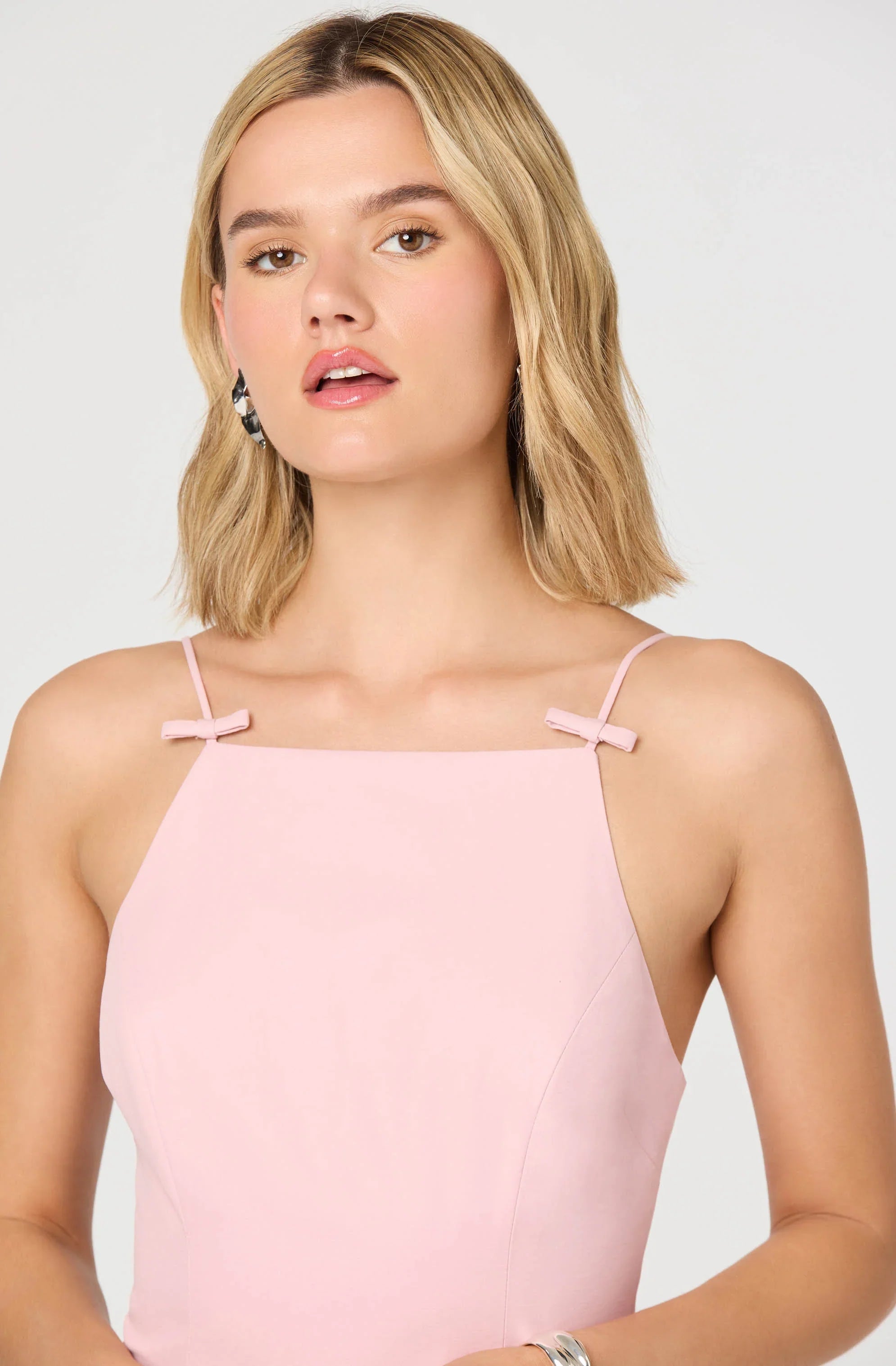Inixyf Tionna Bow-Detail Apron Neck Bubble Mini Dress